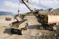 Excavator in the mountains of Eastern Siberia / Earthworks / Mining Royalty Free Stock Photo