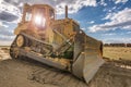 Excavator moving rock and earth in a construction place Royalty Free Stock Photo