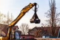 Excavator operation against the background