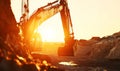 Excavator operation against the sunlight highlighting its power and magnitude Royalty Free Stock Photo