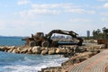 An excavator on the Limassol seafront