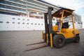 Excavator in Qaboos port. Royalty Free Stock Photo