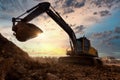 Excavator at sandpit during earthmoving works in the construction site Royalty Free Stock Photo