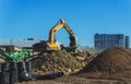 Excavator and screener machine working Royalty Free Stock Photo