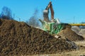 Excavator and screener machine working Royalty Free Stock Photo