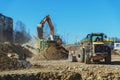 Excavator and screener machine working Royalty Free Stock Photo