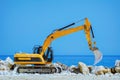 Excavator on the Seaside