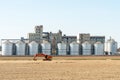silver silos on agro manufacturing plant for processing drying cleaning and storage of agricultural products, flour, cereals and