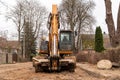 Excavator on the street for road repairing Royalty Free Stock Photo