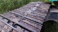 Excavator tracks. Old iron caterpillars of the bulldozer of the tractor on the road. bulldozer caterpillar tracks. Black caterpill Royalty Free Stock Photo