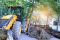 Excavator tractor digging a trench for pipeline Royalty Free Stock Photo