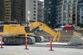 Excavator used in downtown construction
