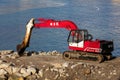 Excavator on the waterfront in Trapani, Sicily Royalty Free Stock Photo