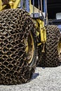 Excavator wheel with anti-slip chain , Big wheels with anti-slip chains Royalty Free Stock Photo