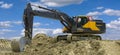 Excavator at work on construction site Royalty Free Stock Photo