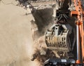 Excavator at work on demolition site Royalty Free Stock Photo