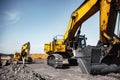 Excavator work loading of coal into Yellow mining truck. Open pit mine industry Royalty Free Stock Photo