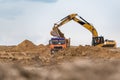 Excavator working on the construction site Royalty Free Stock Photo