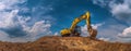 The excavator working on a dirt pile under a vibrant blue sky. AI generated image Royalty Free Stock Photo