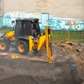 the excavator is working on emergency work to repair the pipeline, a breakthrough in the water supply and heating pipeline.