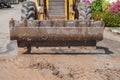 Excavator working on the Repair of pipe water on road Royalty Free Stock Photo