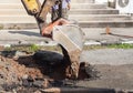 Excavator working on the Repair of pipe water and sewerage on road Royalty Free Stock Photo