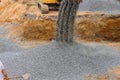 A excavator in a working to gravel construction equipment for foundation construction Royalty Free Stock Photo