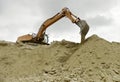 Excavator works in the quarry for quarrying sand Royalty Free Stock Photo
