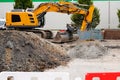 Excavator yellow in construction site street Royalty Free Stock Photo