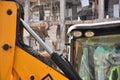 Excavators on a demolition site with old demolished building in the background. Old building being demolished to make room for new Royalty Free Stock Photo