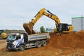 Excavators are digging and loading the excavation to truck