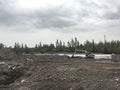 Excavator grab in the river, China