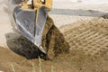 Excavators dumping its load of Royalty Free Stock Photo