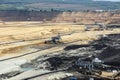 Excavators working on open pit coal mine Royalty Free Stock Photo