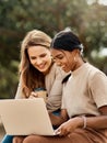 Excellence is a continuous process, not an accident. two attractive young female students using a laptop while sitting Royalty Free Stock Photo