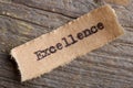 excellence word on a piece of paper close up, business creative motivation concept Royalty Free Stock Photo