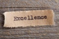 excellence word on a piece of paper close up, business creative motivation concept Royalty Free Stock Photo
