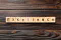 Excellence word written on wood block. Excellence text on wooden table for your desing, concept Royalty Free Stock Photo