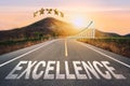 Excellence written on highway road in the middle of empty asphalt road of asphalt road at sunset. business development success Royalty Free Stock Photo