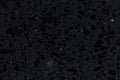 Excellent black synthetic stone background close up.