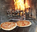 excellent fragrant pizza baked in a wood fireplace with a wood-burning oven 3