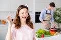 Excellent husband great chef. Two people enjoy hobby cook weekend man prepare raw meat beef dinner frying pan girl Royalty Free Stock Photo