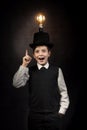 Excellent idea, kid with edison bulb above his head Royalty Free Stock Photo