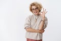Excellent job, very cool. Portrait of happy and pleased bright charming upbeat woman in glasses and stylish outfit