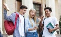 Excellent marks. Surprised students checking exam results Royalty Free Stock Photo