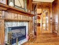 Excellent stone fireplace in hardwood room.