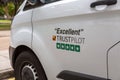 an Excellent trustpilot rating being advertised on the side of a white van