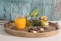 Excellent valentines breakfast of orange juice, heart chocolates and roses