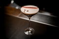 excellent view on glass with espresso martini cocktail decorated with coffee beans Royalty Free Stock Photo