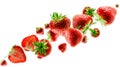 Excellently retouched strawberries, whole and halves, fly in space forming the shape of a chain. Surround light from behind.